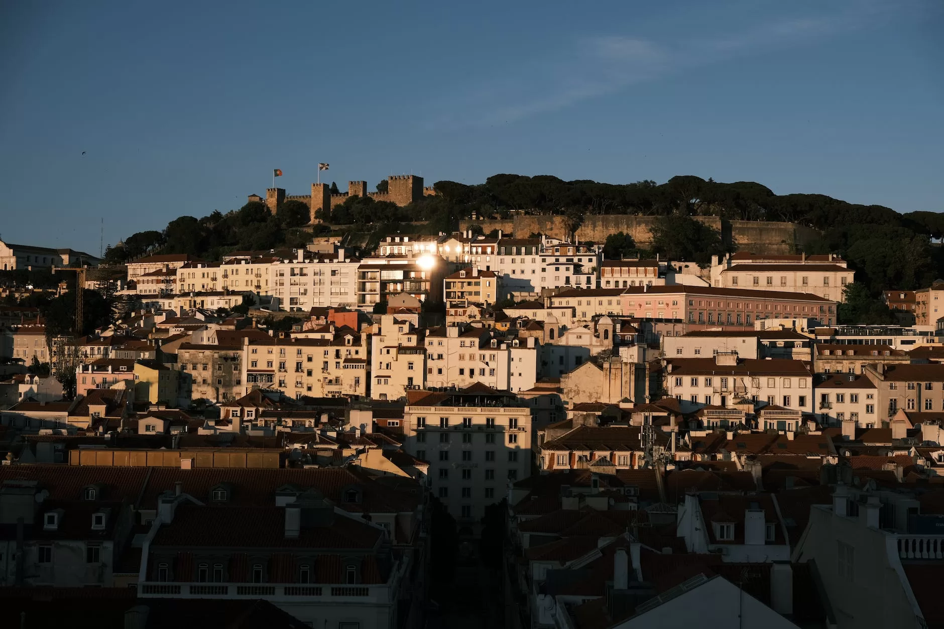 cityscape with sao jorge castle at sunset lisbon portugal