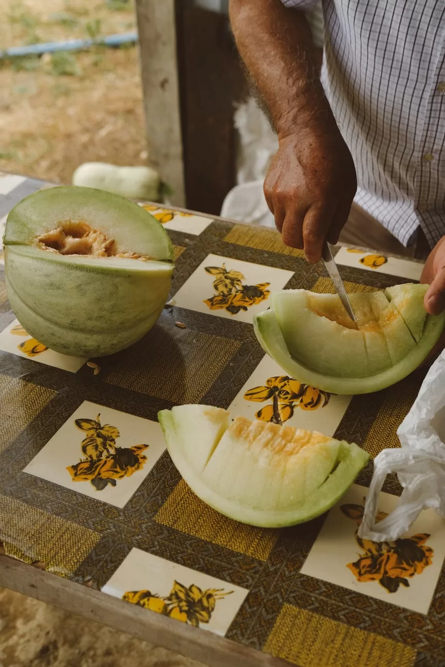 melon being cut on a table