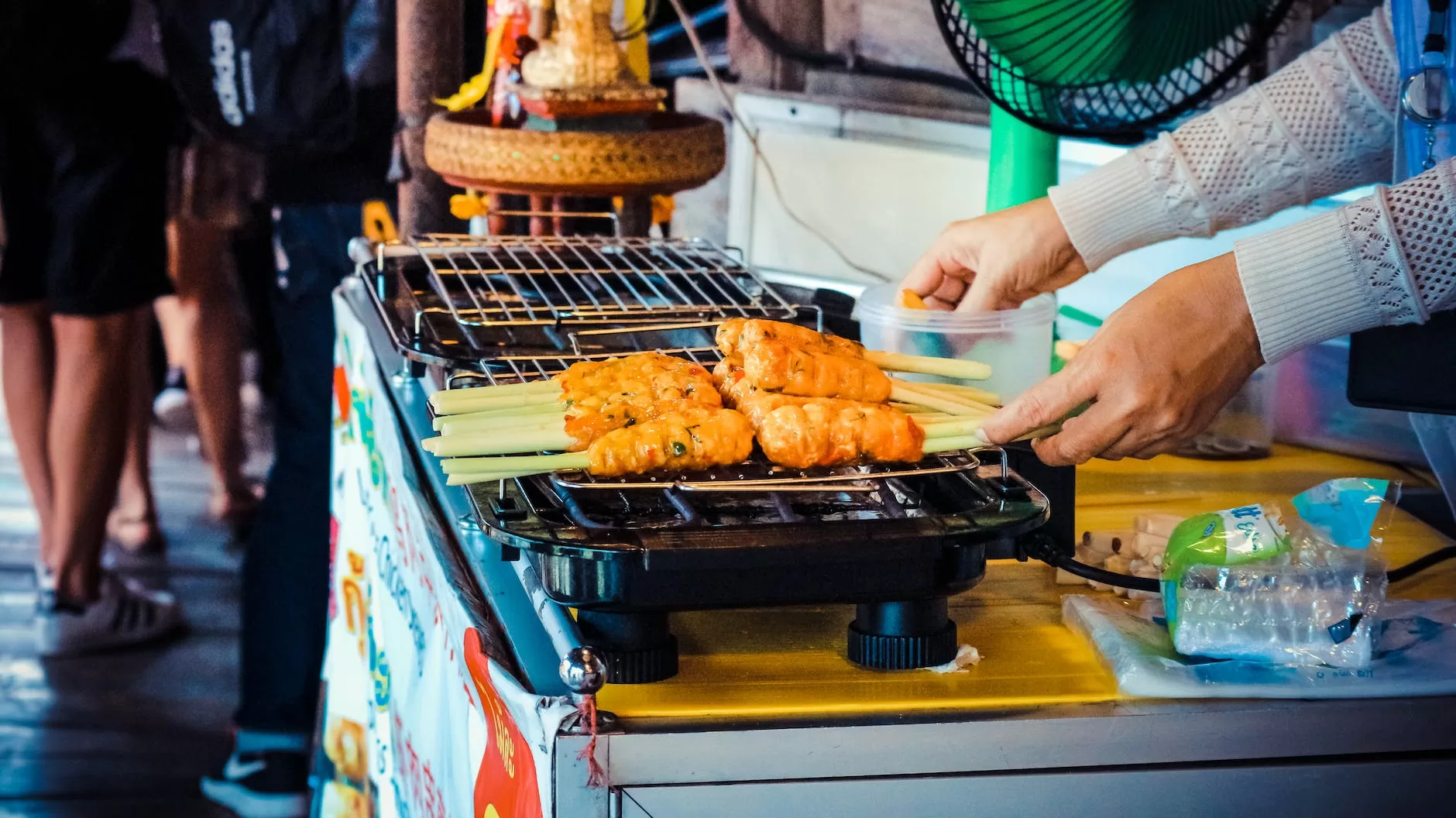 person grilling food for Indonesia Digital Nomad Visa