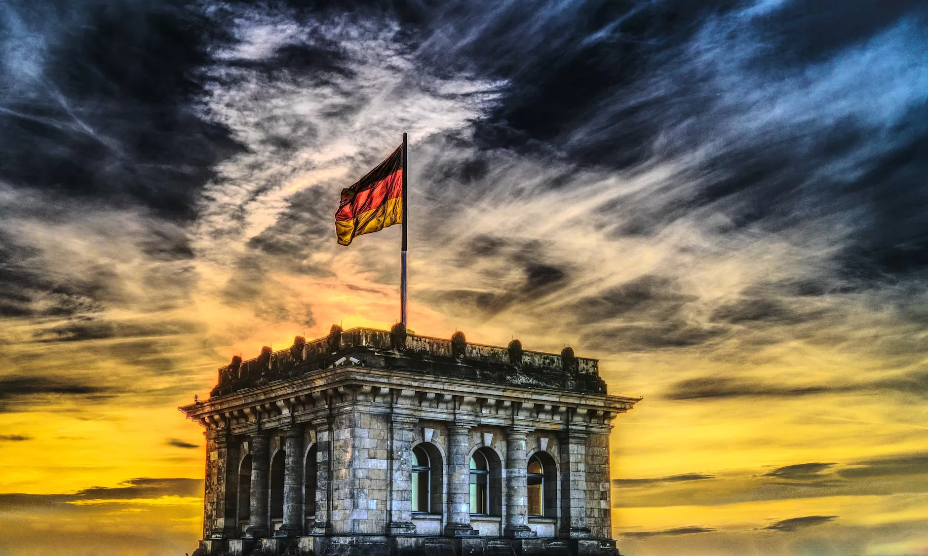 belgium flag on top of the building