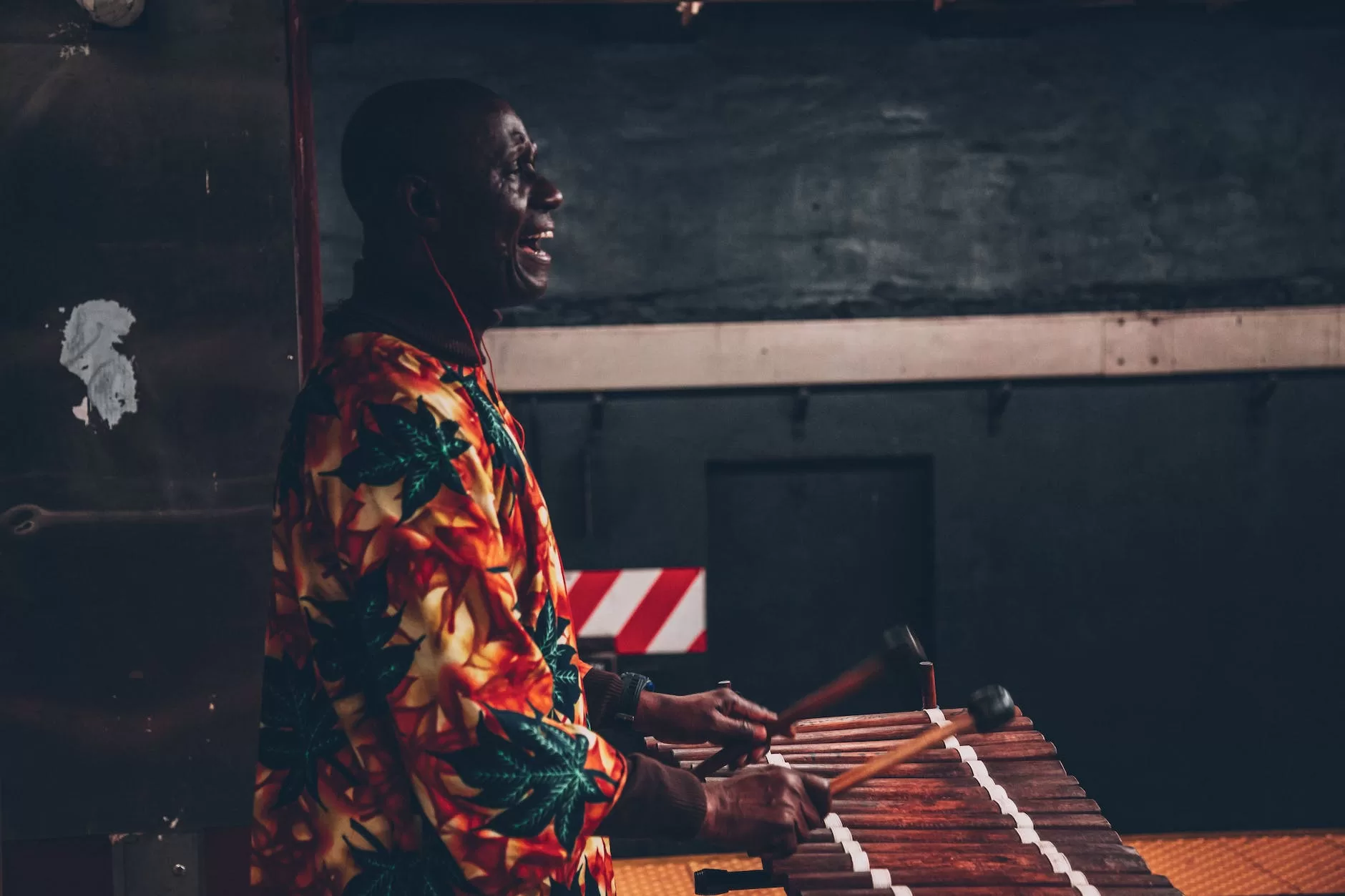 man playing percussion instrument