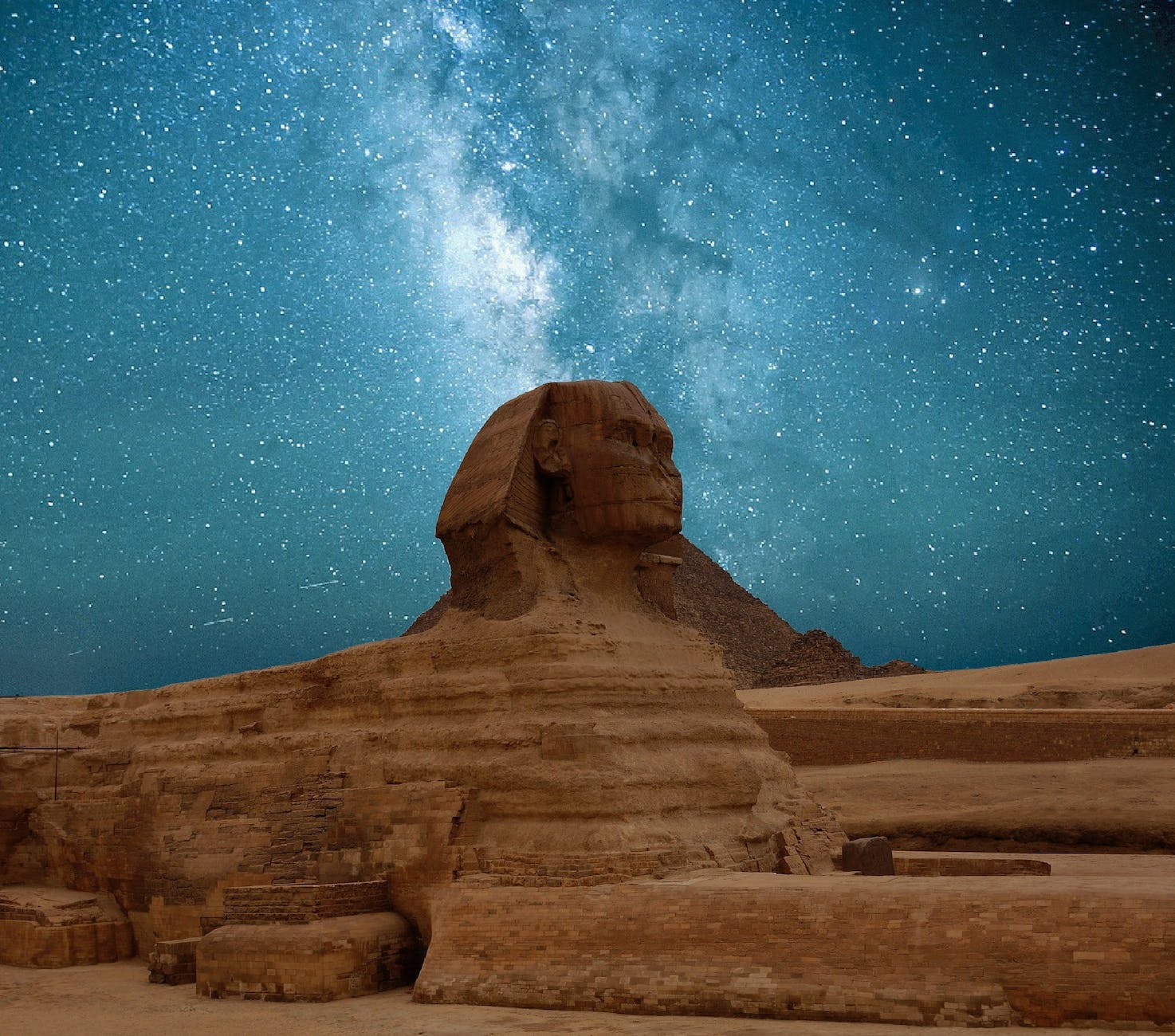 great sphinx of giza under blue starry sky