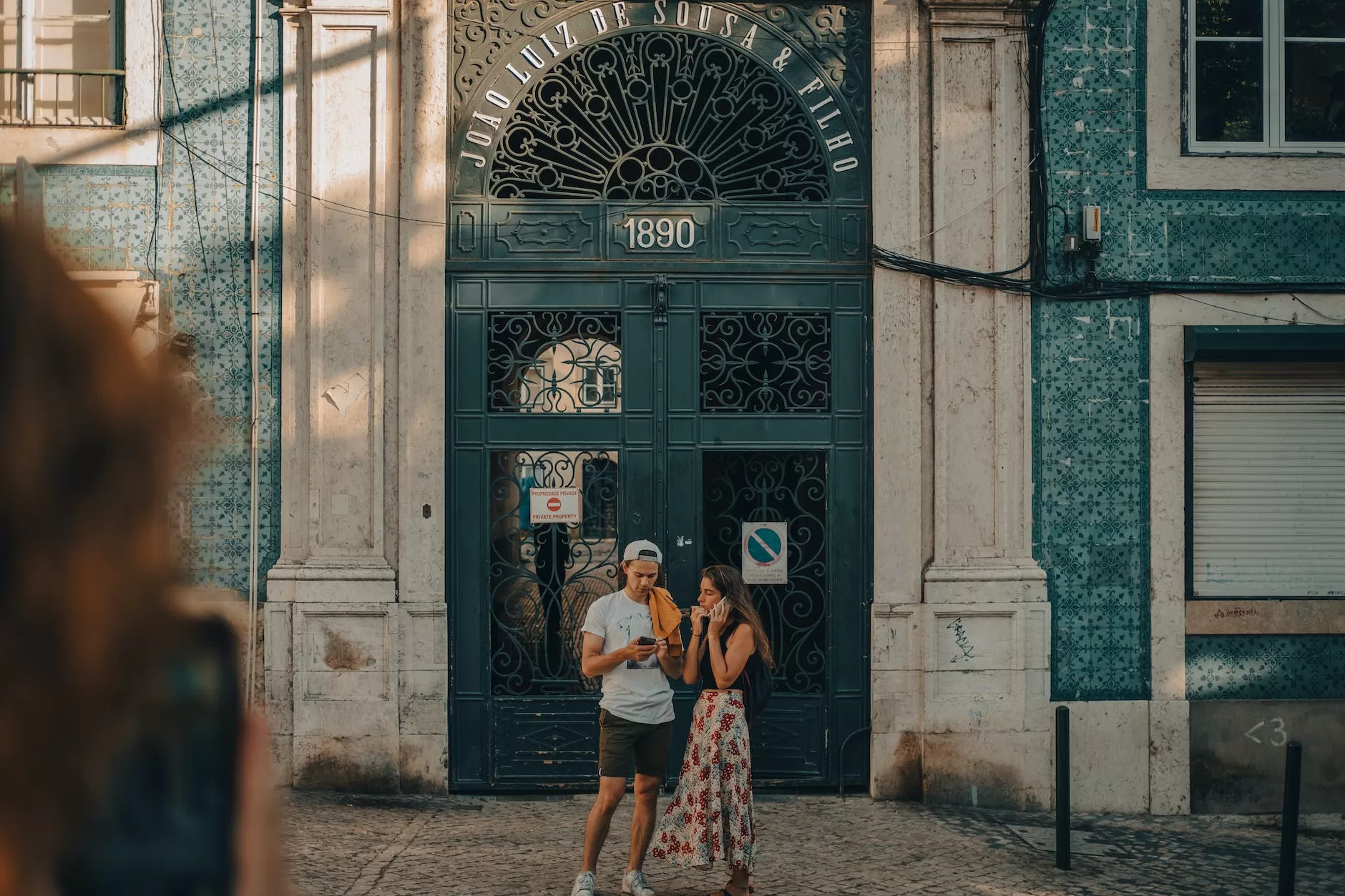 people in front of building searching for cheap flights