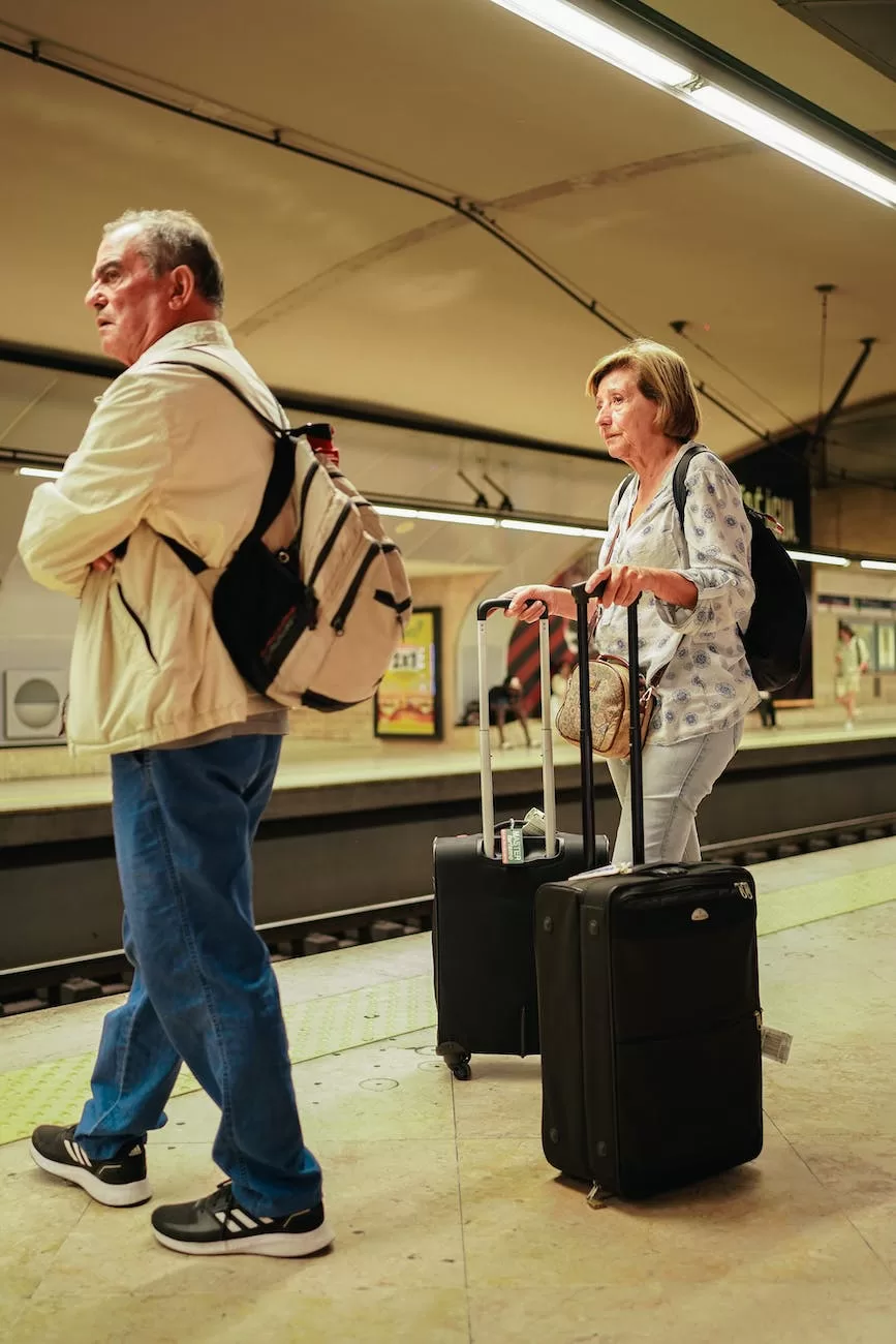 man and woman waiting for metro with their luggage