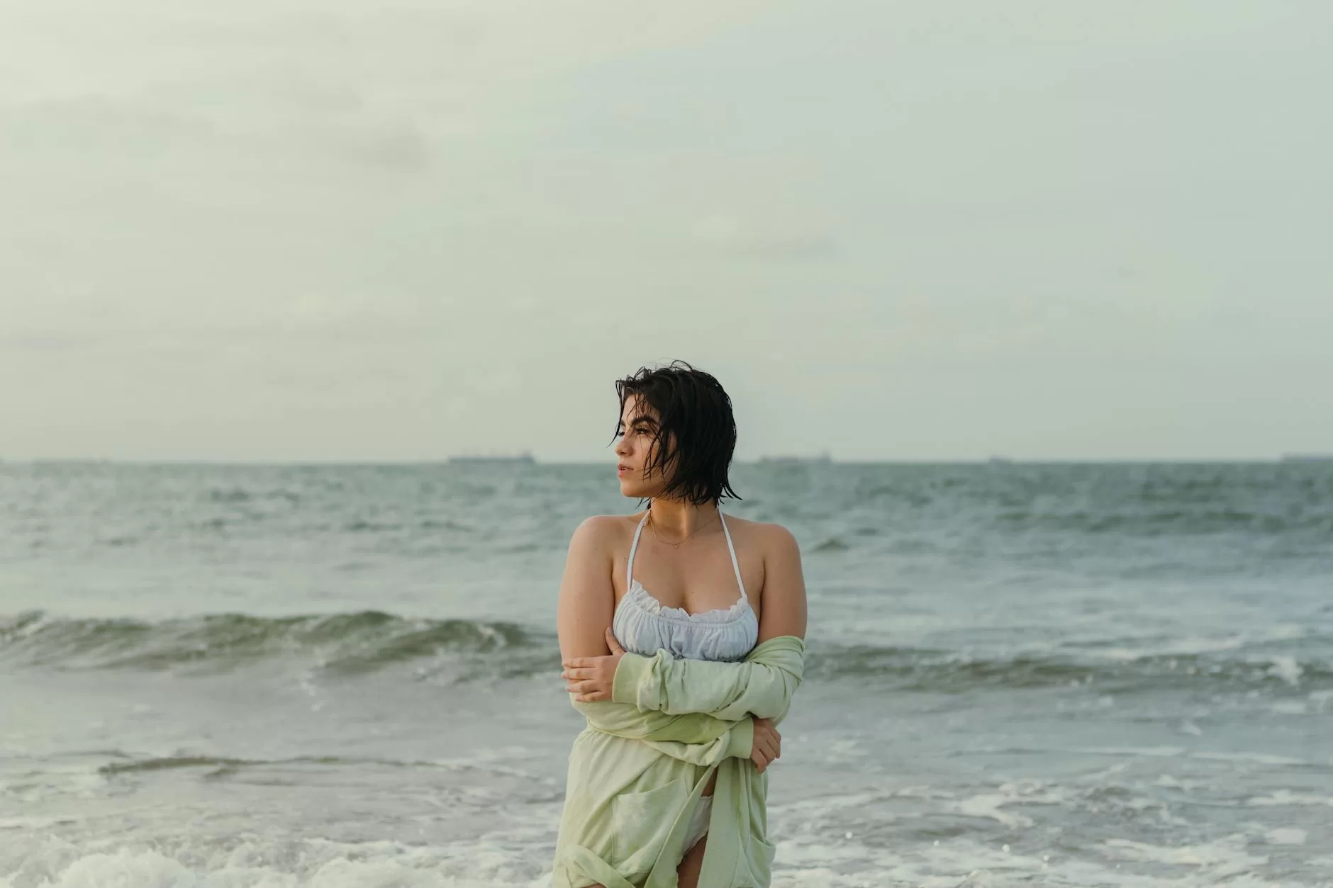 woman posing near sea