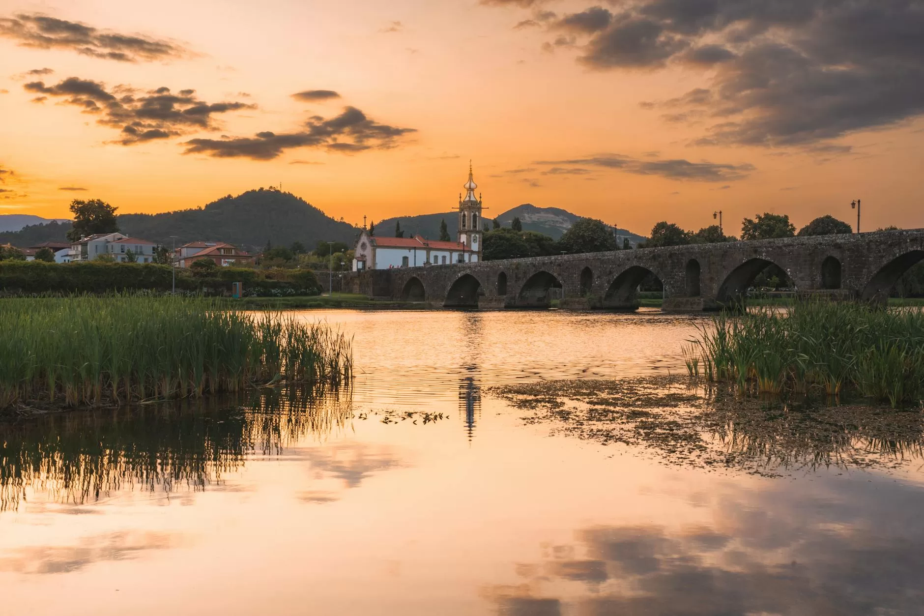 sunset at the medieval bridge at ponte de lima portugal