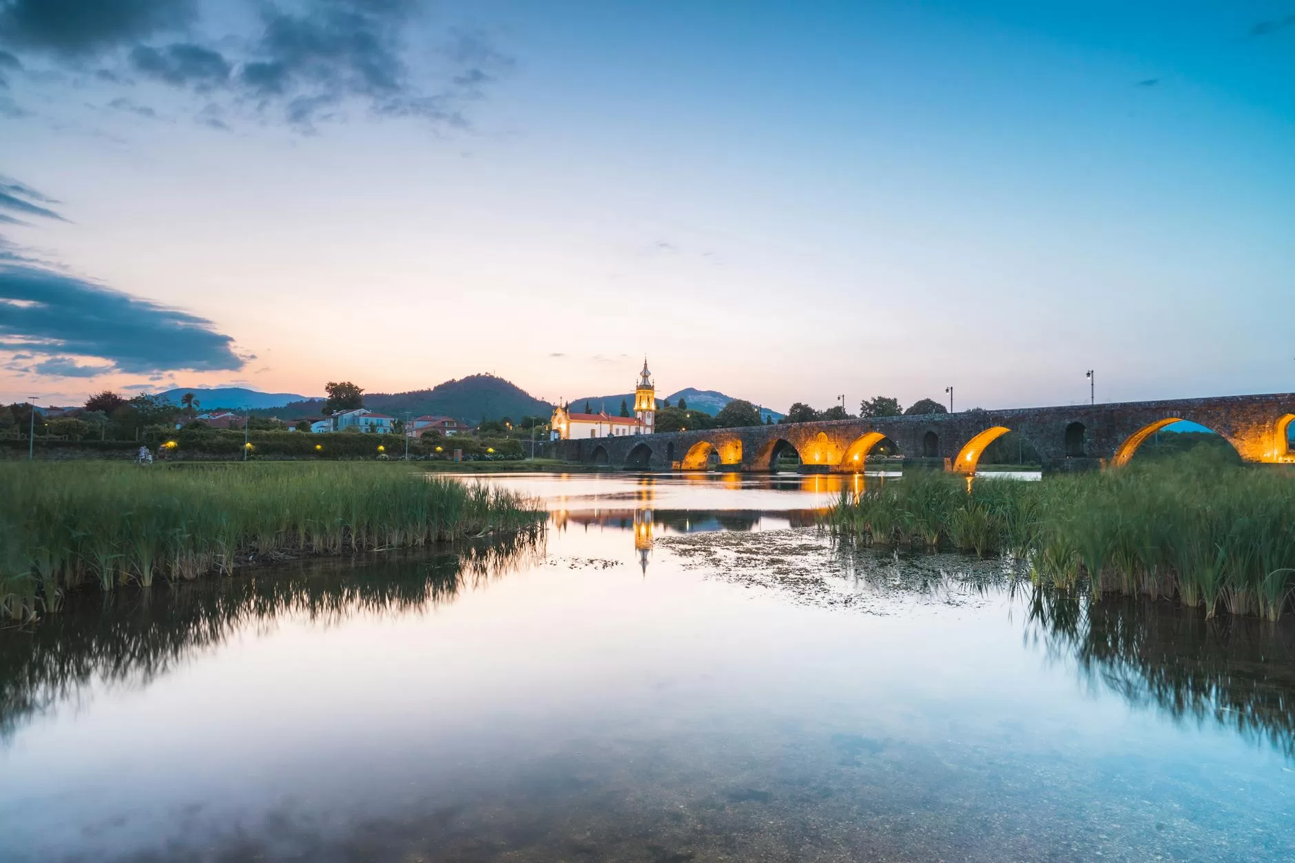 evening at the medieval bridge at ponte de lima portugal