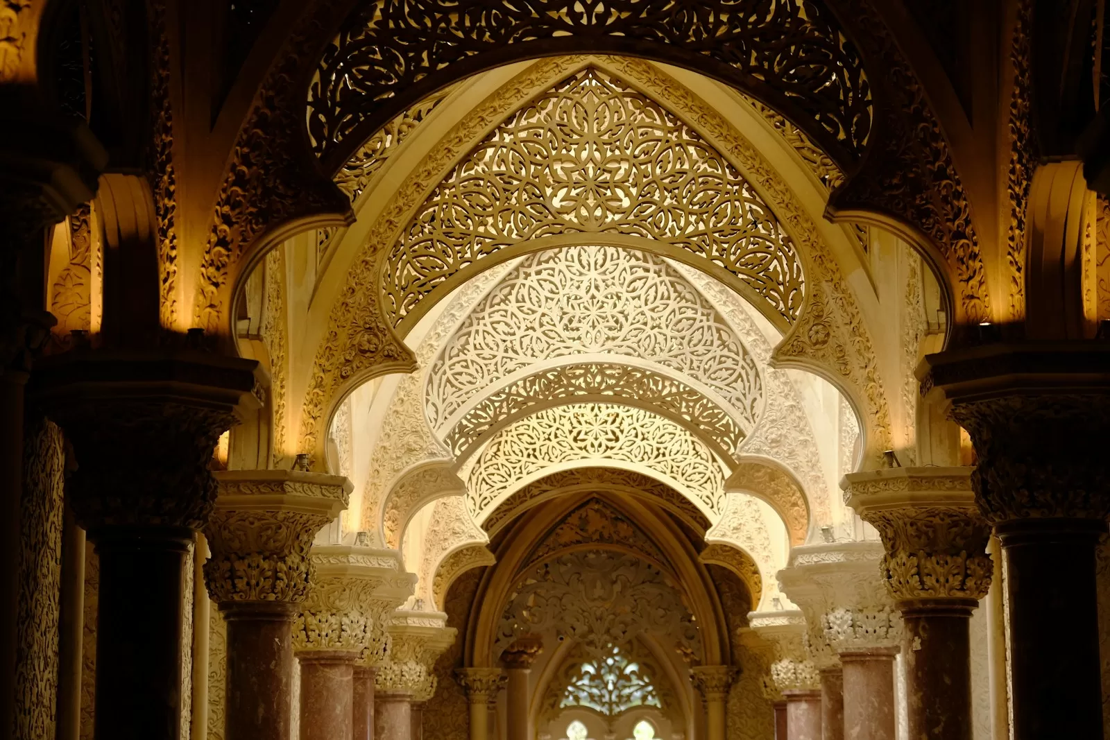 the inside of a building with a large archway