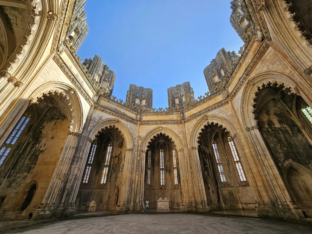 a view of the inside of a cathedral looking up at the sky